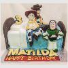Cowgirl and friends character bed cake. Price band E