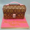 Logo bag cake. Price band E